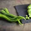 Fresh green Sera Demre hot pepper on slate