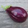 Topak_Adana_eggplant Shiny purple Topak Adana eggplant on wood