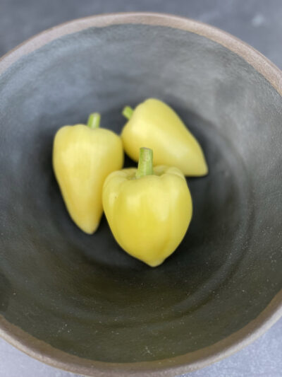 Somborka Three Somborka hot peppers placed in a pho bowl.