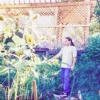 Moghadam Rocambole_8 Jamshid Moghadam watering his home garden in Colorado