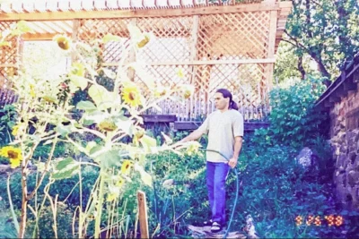 Moghadam Rocambole_8 Jamshid Moghadam watering his home garden in Colorado