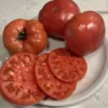 pink_tomato_brandywine_sliced Sliced pink tomatoes in a plate